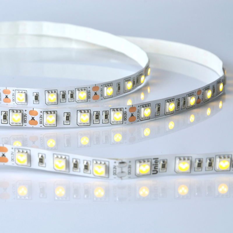 Светодиодная лента Uniel ULS-M25-5050-60LED/m-10mm-IP20-DC12V-14,4W/m-5M-3000K PROFI катушка в герметичной упаковке