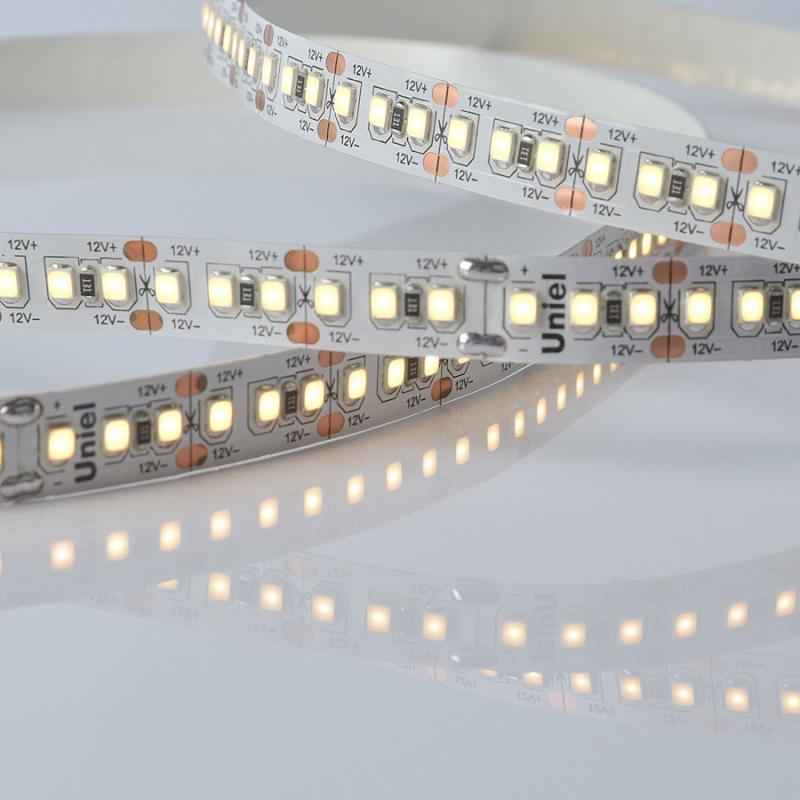 Светодиодная лента Uniel ULS-M16-2835-180LED/m-10mm-IP20-DC12V-17W/m-5M-3000K PROFI катушка в герметичной упаковке